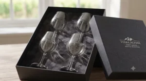 A premium gift box containing a set of four professional pinot grigio glasses.